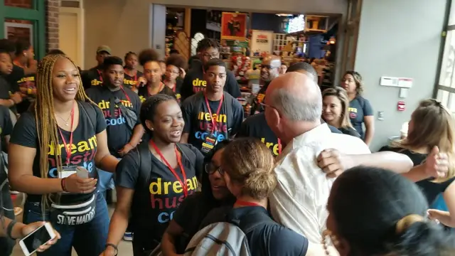 Dream Hustle Code students greeting hosts on arrival